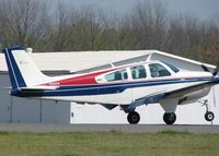 N3132W @ DTN - Front wheel about to touch down on runway 14 at Downtown Shreveport. - by paulp