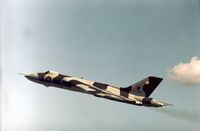XL359 @ YEO - Vulcan B.2 of 230 Operational Conversion Unit climbing after displaying at the 1977 RNAS Yeovilton Air Day. - by Peter Nicholson