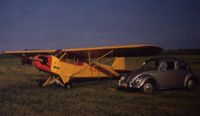 N38737 @ FCM - A J3 Cub with Red nose.  Two owners called it Rudolph - by S. Steve Adkins