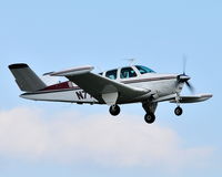 N771T @ 5W8 - Departing runway 22 - by John W. Thomas