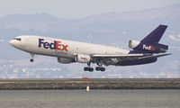 N559FE @ KSFO - Good old DC 10 turned into an MD10, landing on rwy 28L. Best of both worlds: fantastic stability AND digital Honeywell cockpit panel. - by Philippe Bleus