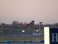 N719SW @ KSTL - JUST AFTER TAKEOFF, GEAR UP - by Gary Schenaman