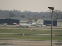 N935XJ @ KSTL - TAKEOFF - by Gary Schenaman