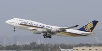 9V-SMU @ KLAX - Departing LAX on 25R - by Todd Royer