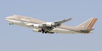 HL7418 @ KLAX - Departing LAX on 25R - by Todd Royer