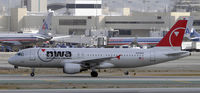 N355NW @ KLAX - Taxi to gate - by Todd Royer
