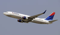N377DA @ KLAX - Departing LAX on 25R - by Todd Royer