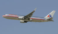 N389AA @ KLAX - Departing LAX on 25R - by Todd Royer