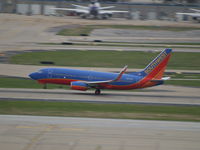 N452WN @ KSTL - TAKEOFF ROLL AT ST. LOUIS - by Gary Schenaman