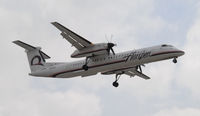 N410QX @ KLAX - Landing 24R at LAX - by Todd Royer