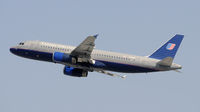 N413UA @ KLAX - Departing LAX on 25R - by Todd Royer