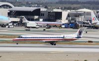 N839AE @ KLAX - EMB-135KL - by Mark Pasqualino