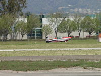 N69LR @ POC - Taxiing to 26R at Brackett - by Helicopterfriend