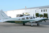 N8128J @ KSRQ - Seneca II - by Joel Cox