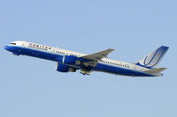 N547UA @ KLAX - Departing LAX on 25R - by Todd Royer