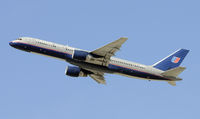N556UA @ KLAX - Departing LAX on 25R - by Todd Royer