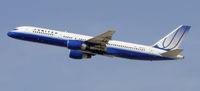 N558UA @ KLAX - Departing LAX on 25R - by Todd Royer