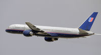 N579UA @ KLAX - Departing LAX on 25R - by Todd Royer