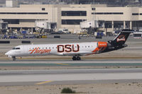 N609QX @ KLAX - Taxi to gate - by Todd Royer