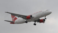 N628VA @ KLAX - Landing 24R at LAX - by Todd Royer