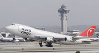 N643NW @ KLAX - Departing LAX on 25L - by Todd Royer