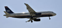 N647AW @ KLAX - Landing 24R at LAX - by Todd Royer