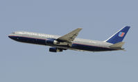 N673UA @ KLAX - Departing LAX on 25R - by Todd Royer