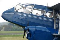 G-AGTM @ EGBO - Captain in the Cockpit of this Classic Airliner - by Terry Fletcher