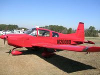 N200BD @ GA2 - Solid Red w/ Blk Numbers - Grey Leather interior - by Paul Morel