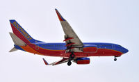 N712SW @ KLAX - Landing 24R at LAX - by Todd Royer