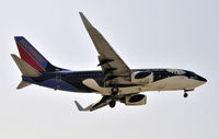 N713SW @ KLAX - Landing 24R at LAX - by Todd Royer