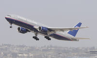 N784UA @ KLAX - Departing LAX on 25R - by Todd Royer