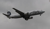 N797AS @ KLAX - Landing 24R at LAX - by Todd Royer