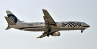 N799AS @ KLAX - Landing 24R at LAX - by Todd Royer