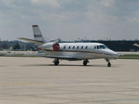 N610QS @ KSTL - ON TARMAC - by Gary Schenaman