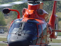 6590 @ POC - USCG Dolphin HH 65C working at taxiing to parking apron. Was called Jaws 90 during IRAQI FREEDOM deployment from Barber's Point, Hawaii - by Helicopterfriend