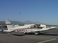 N4142J @ POC - Tied down and waiting - by Helicopterfriend