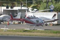 N695MC @ TNCM - At the helipad - by SHEEP GANG