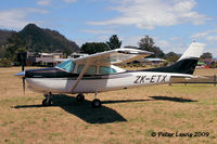 ZK-ETX @ NZUN - Professional Colour Laboratories Ltd., Auckland - by Peter Lewis