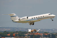 N780E @ KSAT - Gulfstream IV retracting its gear during climb out - by FBE