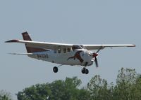 N410AB @ DTN - Landing on runway 14 at the Shreveport Downtown airport. - by paulp