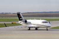 N310TK @ CID - Taxiing in to Landmark FBO. - by Glenn E. Chatfield