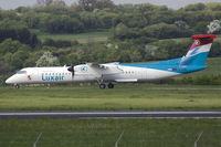 LX-LGC @ EDDR - Luxair Q400 taxies via taxyway alpha at EDDR - by FBE