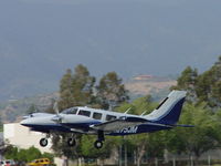 N275JM @ POC - Lifting off westbound from 26L - by Helicopterfriend