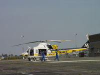 N14LA @ POC - Pilot in, co-pilot standing by, Paramedic headed for arriving ambulance - by Helicopterfriend