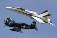 N45NL @ LFI - US Navy Tailhook formation flight with Chance Vought F4U-5NL Corsair N45NL and active US Navy McDonnell Douglas F/A-18C 164630 from VFA-106 Gladiators based at NAS Oceana. - by Dean Heald