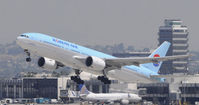 HL7598 @ KLAX - Departing LAX on 25R - by Todd Royer