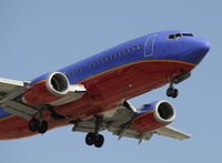 N307SW @ KLAX - Landing 24R at LAX - by Todd Royer