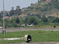 N469ZP @ POC - Waiting permission to cross runway 26L - by Helicopterfriend