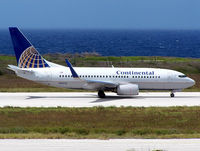 N15712 @ TNCC - Continental Boeing 737-724 @ CUR - by John van den Berg - C.A.C